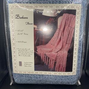 Barbara Throw in blue, made of 100% Rayon, measuring 45"x57" with a 10" fringe